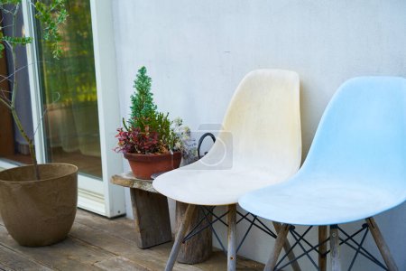 Photo for Two chairs on the balcony outdoors - Royalty Free Image