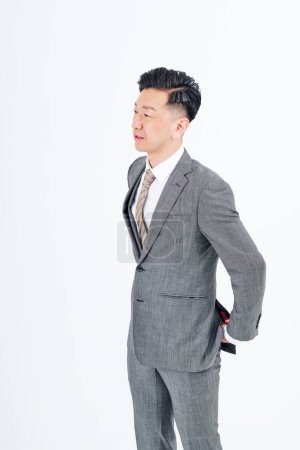 Photo for Portrait of man in suit and white background - Royalty Free Image