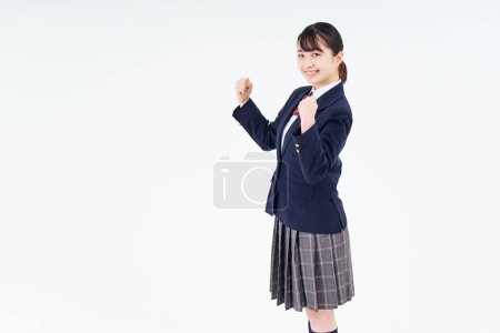 Téléchargez les photos : A high school girl cheering and white background - en image libre de droit