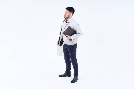Foto de Business person in work clothes and white background - Imagen libre de derechos