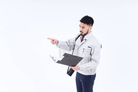 Photo pour Business person in work clothes confirming pointing and white background - image libre de droit