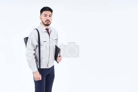 Téléchargez les photos : Business person in work clothes and white background - en image libre de droit
