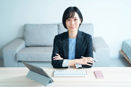 Photo for Portrait of a business woman working at office - Royalty Free Image