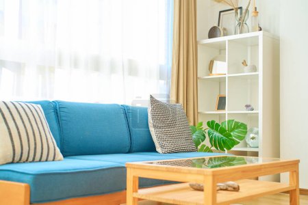Photo for Bright interior with a blue sofa - Royalty Free Image