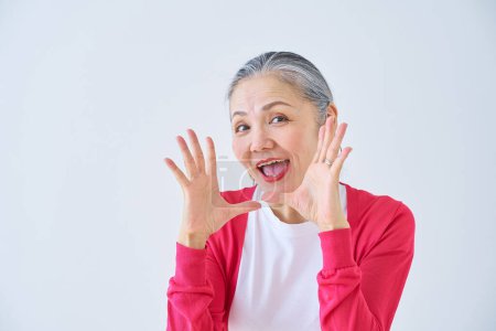Photo for A senior woman cheering in the room - Royalty Free Image