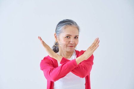 Photo for Senior woman giving a no sign indoors - Royalty Free Image