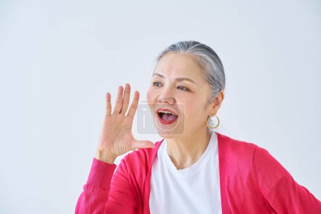 Photo for A senior woman cheering in the room - Royalty Free Image