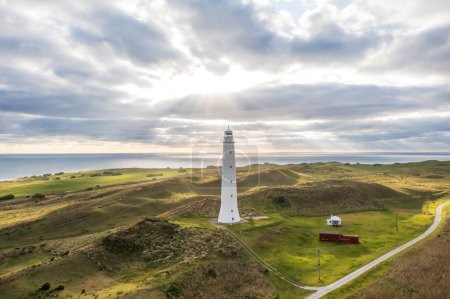 Drone aerial photograph of Cape Wickham Lighthouse early in the morning on a cloudy day in Currie on the northern part of King Island in Tasmania