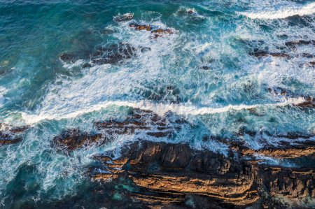 Drone aerial photograph of the rugged and rocky coastline of Fitzmaurice Bay on King Island in Tasmania in Australia