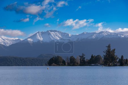 Photo for Photograph of Te Anua Lake in the township of Te Anau in Fiordland on the South Island of New Zealand - Royalty Free Image