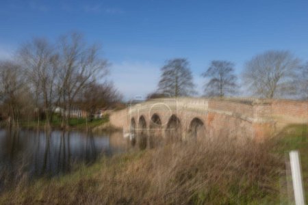 A bridge at Burton Constable with Intentional camera movement and multiple exposures