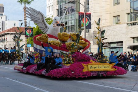 Photo for Pasadena, California, United States - January 2, 2022: the Odd Fellows & Rebekahs float, spreading a message of peace,  shown during the 134th Rose Parade. - Royalty Free Image