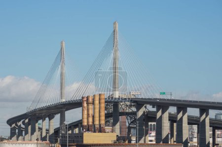 The Gerald Desmond Bridge in Long Beach, California, shown on a sunny day.