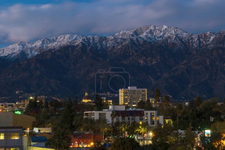 Photo for Pasadena, California, United States: City of Pasadena in Los Angeles County on a windy day, looking north, showing the San Gabriel Mountains after intense rainfall, on March 1, 2023. - Royalty Free Image