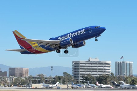 Photo for John Wayne Airport, California, USA, on February 19, 2022: Southwest Airlines Boeing 737-790 with registration N560WN shown airborne. - Royalty Free Image
