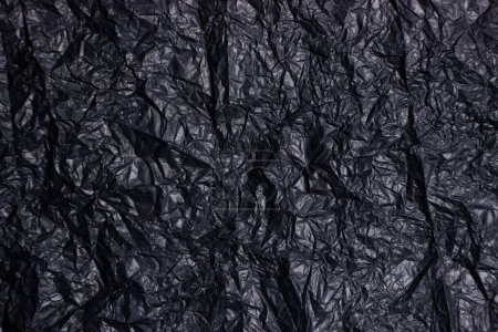 Foto de Fondo abstracto de papel satinado arrugado negro - Imagen libre de derechos