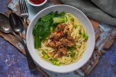 Téléchargez les photos : Mie Rebus Cakalang is a noodles soup mix with skipjack tuna  from Manado, North Sulawesi, Indonesia - en image libre de droit