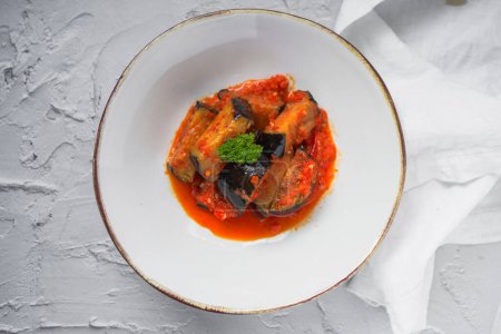 Terong Balado is Indonesian food made of deep-fried eggplants cooked with spicy chili sambal