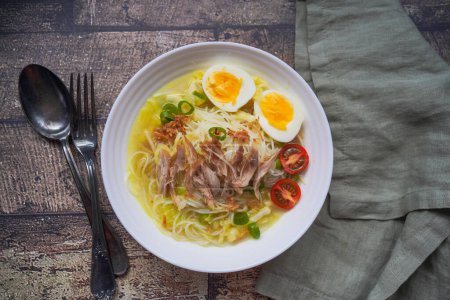 Soto is a traditional Indonesian soup mainly composed of broth, chicken, and vegetables.