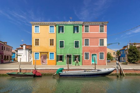 Photo for Venice - 25 May 2017 - Island of Burano with Colourful Houses and Lagoon under Blue Skies and Summer Sun in City of Venice 03, Italy - Royalty Free Image