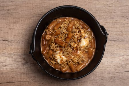 Photo for Korean flavor instant noodles with tteokbokki in a pot - Royalty Free Image