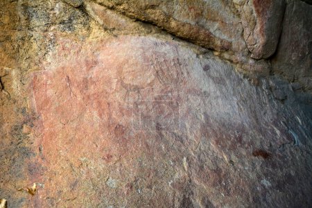 Rock drawings of ancient ancestors on stones. Animal hunting scenes. Art legacy of ancestors
