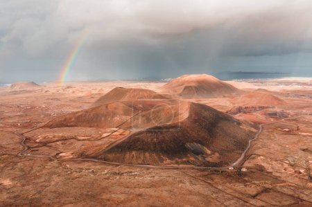 Photo for Fuerteventura sand volcano with rainbow - Royalty Free Image