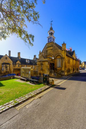 Photo for Chipping Campden, UK - October 18, 2022: View of the historic town hall building, with locals and visitors, in Chipping Campden, the Cotswolds region, England, UK - Royalty Free Image