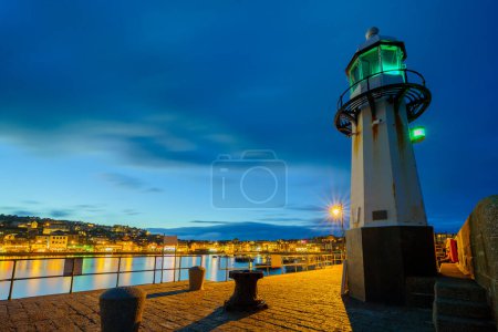 Téléchargez les photos : Vue du soir du phare et du port, à St Ives, Cornouailles, Angleterre, Royaume-Uni - en image libre de droit