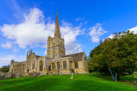Photo for View of St. John the Baptist church, in Burford, the Cotswolds region, England, UK - Royalty Free Image