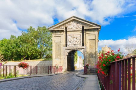 View of the Gate of Cassel, incorporating the radiating sun of Louis XIV, in Bergues, Northern France