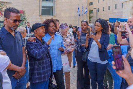 Photo for Haifa, Israel - April 02, 2024: Family members of Solomon Teka, and Supporters, after the controversial verdict that acquitted the police officer that shot him dead in 2019. Haifa courthouse, Israel - Royalty Free Image