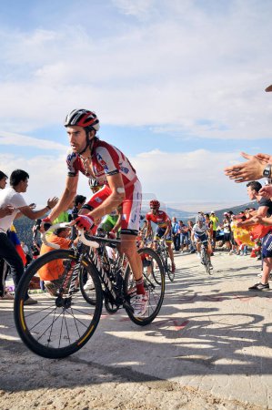 Photo for 08-09-2012 Madrid, Spain - A thrilling stage of La Vuelta Espaa unfolds at the iconic Bola del Mundo in Navacerrada with Contador, Valverde y Purito as protagonist. - Royalty Free Image