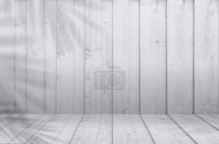 Foto de Fondo de madera blanca, textura de madera lavada con sombra de hoja de palma de coco, silueta de hojas de madera de pared vintage en la superficie de la raya con superposición de hojas, horizonte telón de fondo para la presentación del producto - Imagen libre de derechos