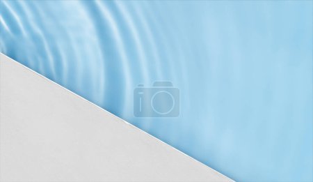 Water Surface with Concrete floor Texture at Swimming pool,Top view Poolside with Podium Display with Light, Shadow on water waves,Empty Blue background for cosmetic beauty 