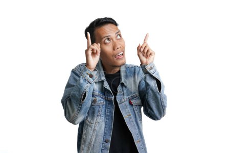 Foto de Asian man wearing blue jean jacket gesturing get idea, isolated on white background - Imagen libre de derechos