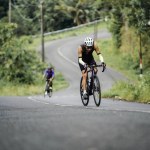 The road bike is going uphill on the cool route of the incline in Panggang area, very aesthetic. Requires great power. : Yogyakarta - Indonesia, February 11, 2022