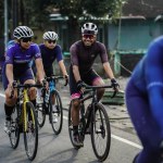 A group of road bike cyclists passed an interesting route in Yogyakarta, in preparation for the Tour de Ambarrukmo. : Yogyakarta - Indonesia, February 11, 2022