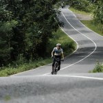 Roadbike riders speed through epic routes in jungle areas. : Yogyakarta - Indonesia, February 11, 2022