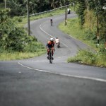 The road bike is going uphill on the cool route of the incline in Panggang area, very aesthetic. Requires great power. : Yogyakarta - Indonesia, February 11, 2022