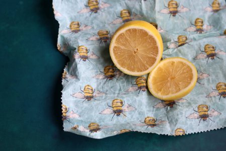 Lemon on beeswax food wrap. Reusable sustainable wrap. Environment friendly alternative of food packaging. 