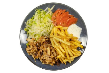 Foto de Plate of kebab and fries close-up, isolated on a white background - Imagen libre de derechos