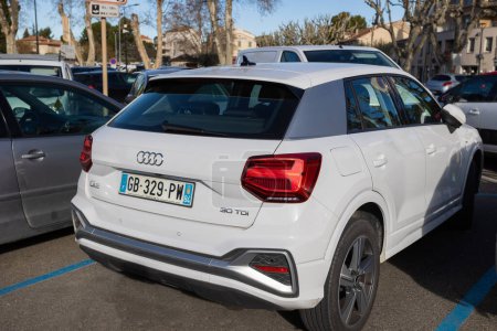 Photo for Vaison la Romaine - France - February 04, 2023 - rear view of an Audi Q2 brand car parked in a parking lot - Royalty Free Image