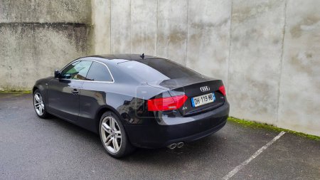 Photo for Vaison la Romaine - France - February 21, 2023 - rear view of Audi A5 brand car parked in a parking lot - Royalty Free Image