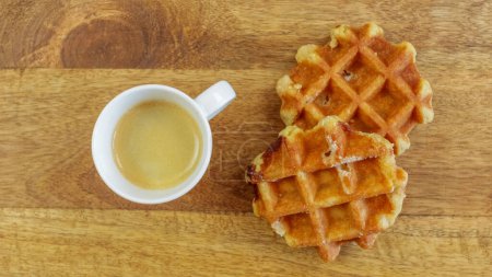 Photo for Espresso and liege waffle on a table - Royalty Free Image