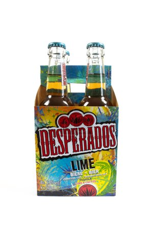 Photo for Vaison le Romaine, Vaucluse, France - 07092023 : pack of four bottles of Desperados lime beer isolated on a white background - Royalty Free Image