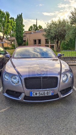 Photo for Vaison la Romaine, Vaucluse, France - 05072023 : front view of a Bentley Continental GT brand car parked in a parking space - Royalty Free Image