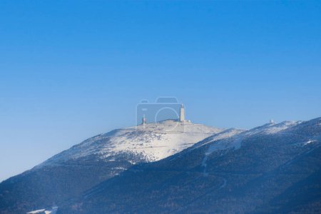 view of snow-capped Mont Ventoux, under a blue sky