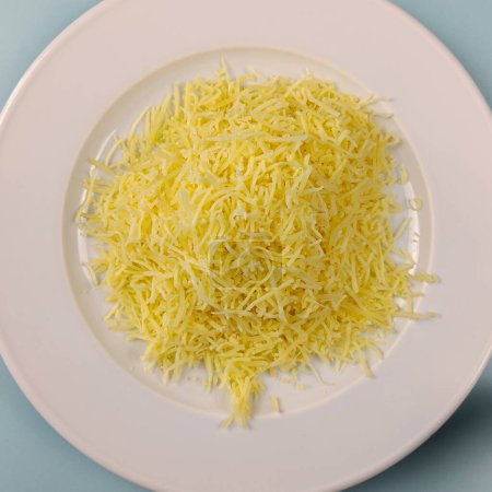 grated cheese, close-up, on a plate