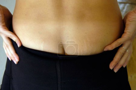 Photo for Bottom or buttocks of a woman, symbol for female sexuality - Royalty Free Image